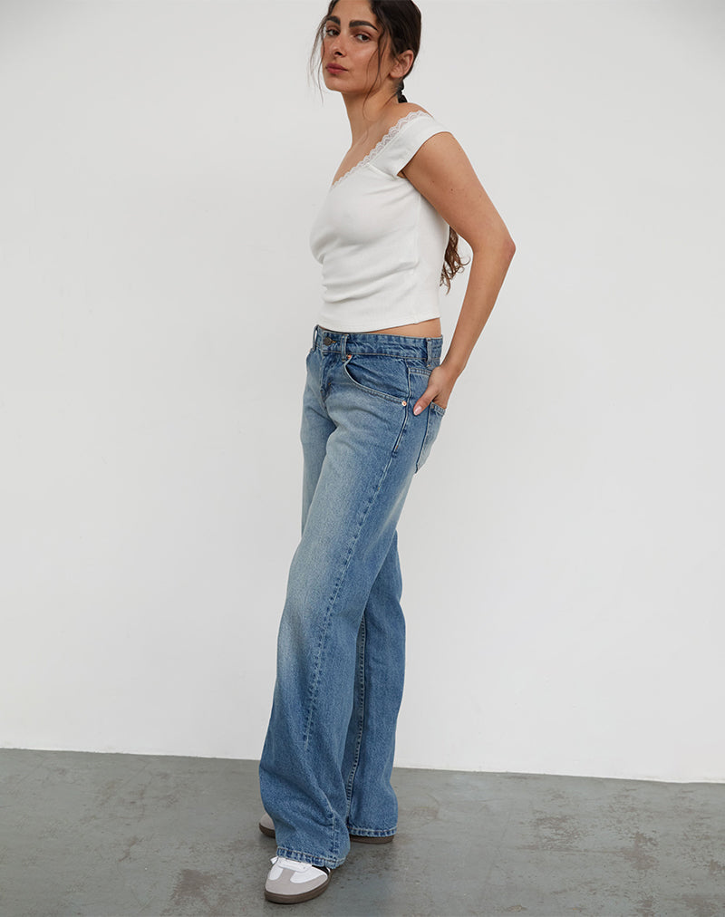 Immagine dei jeans paralleli a vita bassa in blu polvere