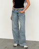 Immagine dei jeans paralleli a vita bassa con lavaggio blu vintage