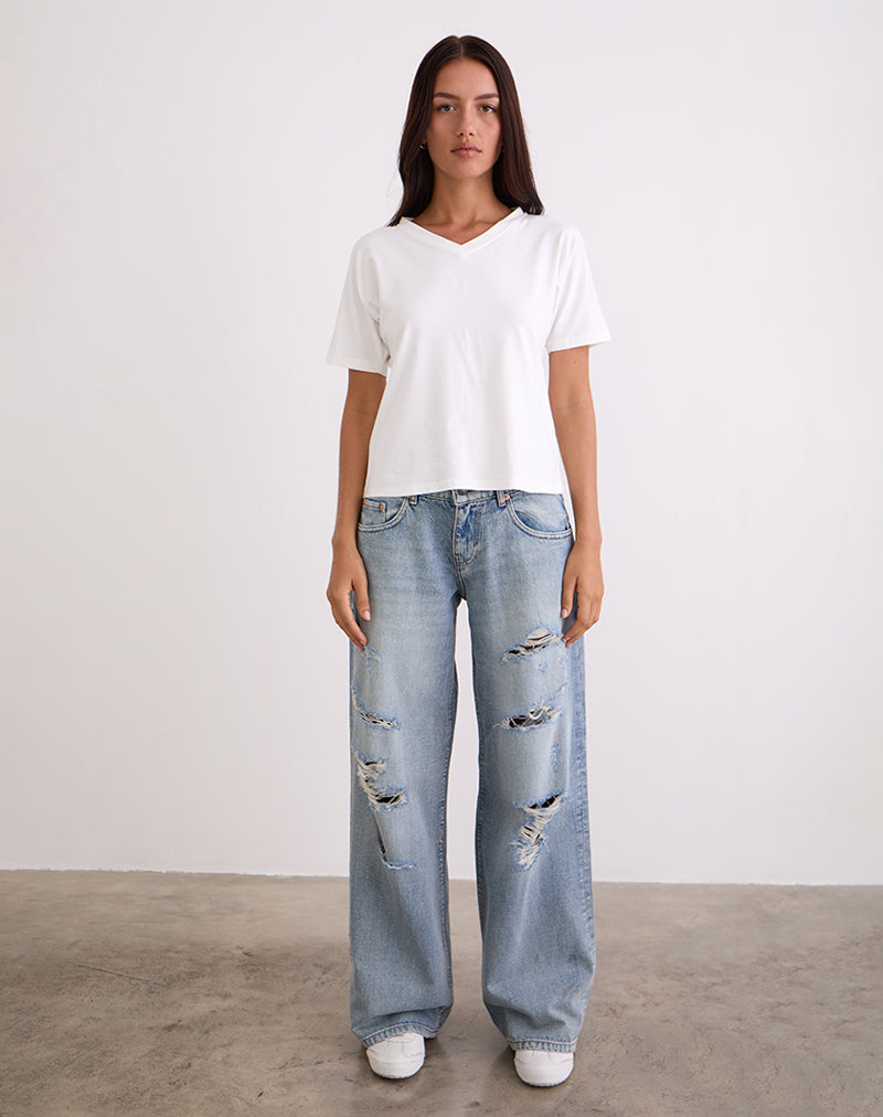 Immagine di Jeans larghi a vita bassa con strappo estremo in blu vintage