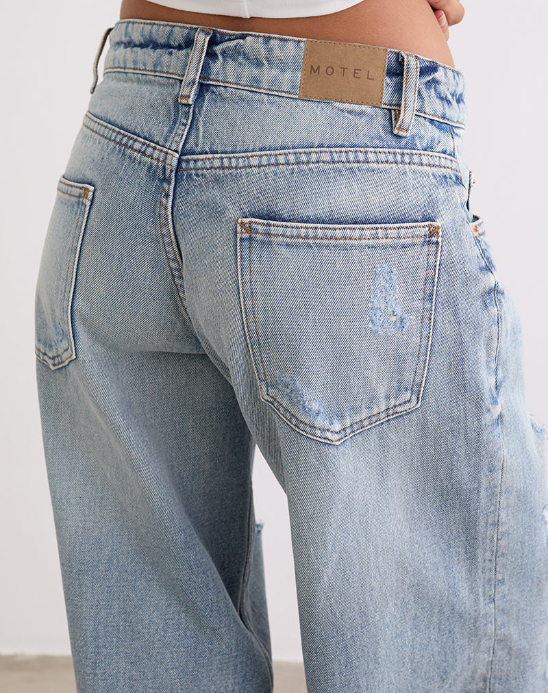 Immagine di Jeans larghi a vita bassa con strappo estremo in blu vintage