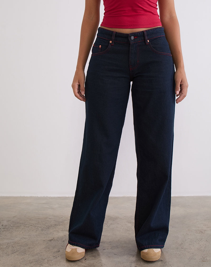 Jeans larghi a vita bassa in indaco con cuciture rosse