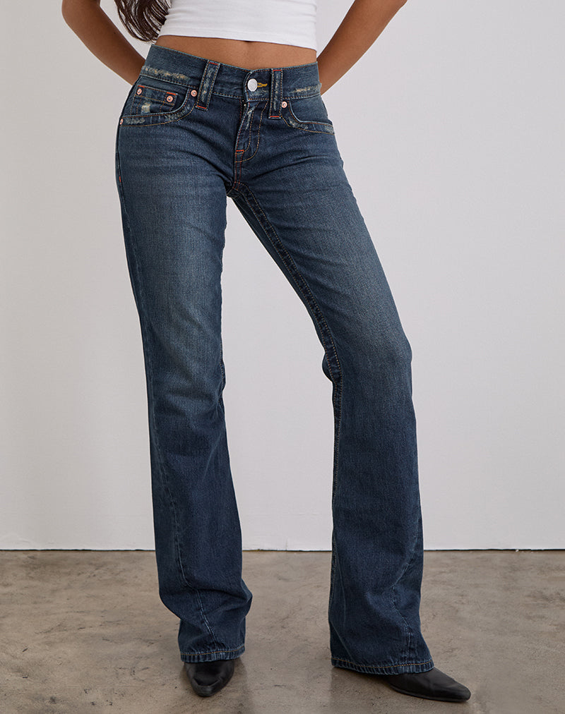 Immagine di Jeans a vita bassa con cuciture ritorte in tinta blu medio