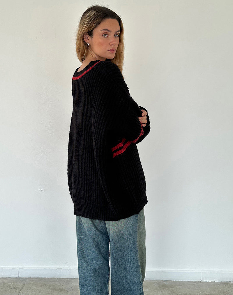 Immagine di Lulees: maglione oversize nero con stelle e strisce rosse.