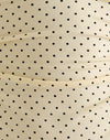 Crema con stampa micropolka nera