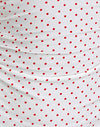 Bianco con stampa micropolka rossa