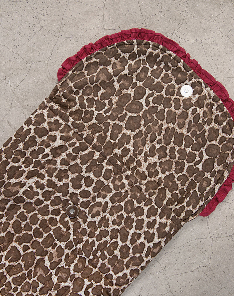 Immagine della borsa per laptop con stampa leopardata e balze rosse