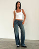 Immagine dei jeans paralleli a vita bassa in blu brillante