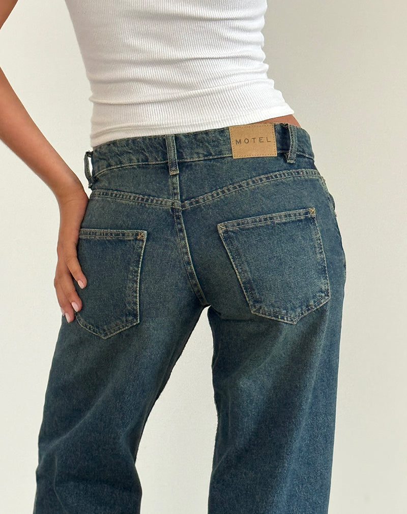 Immagine dei jeans paralleli a vita bassa in blu brillante