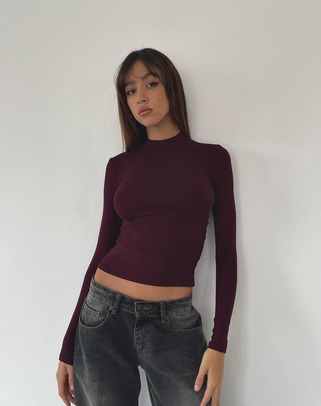 Mabel - Top a maniche lunghe a costine con collo alto in sangue di bue