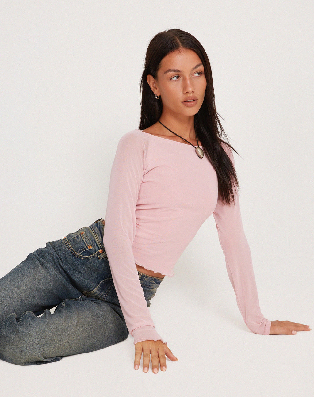 Top a rete a maniche lunghe Mahira in rosa