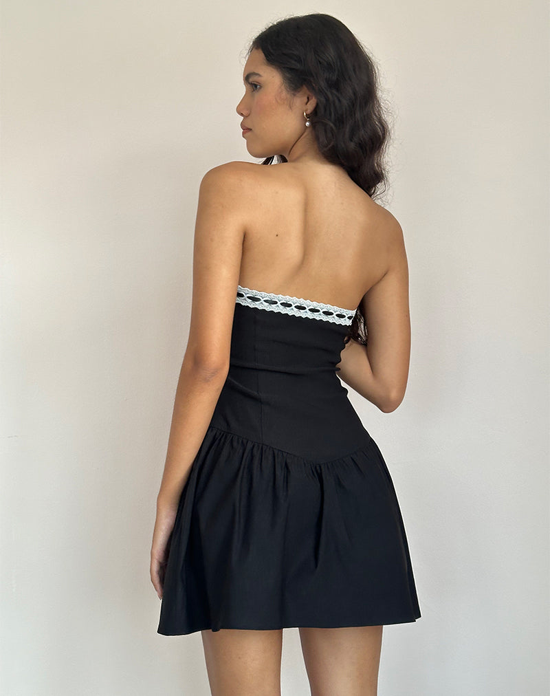 Immagine di Manisha Mini Dress in nero con rifiniture bianche
