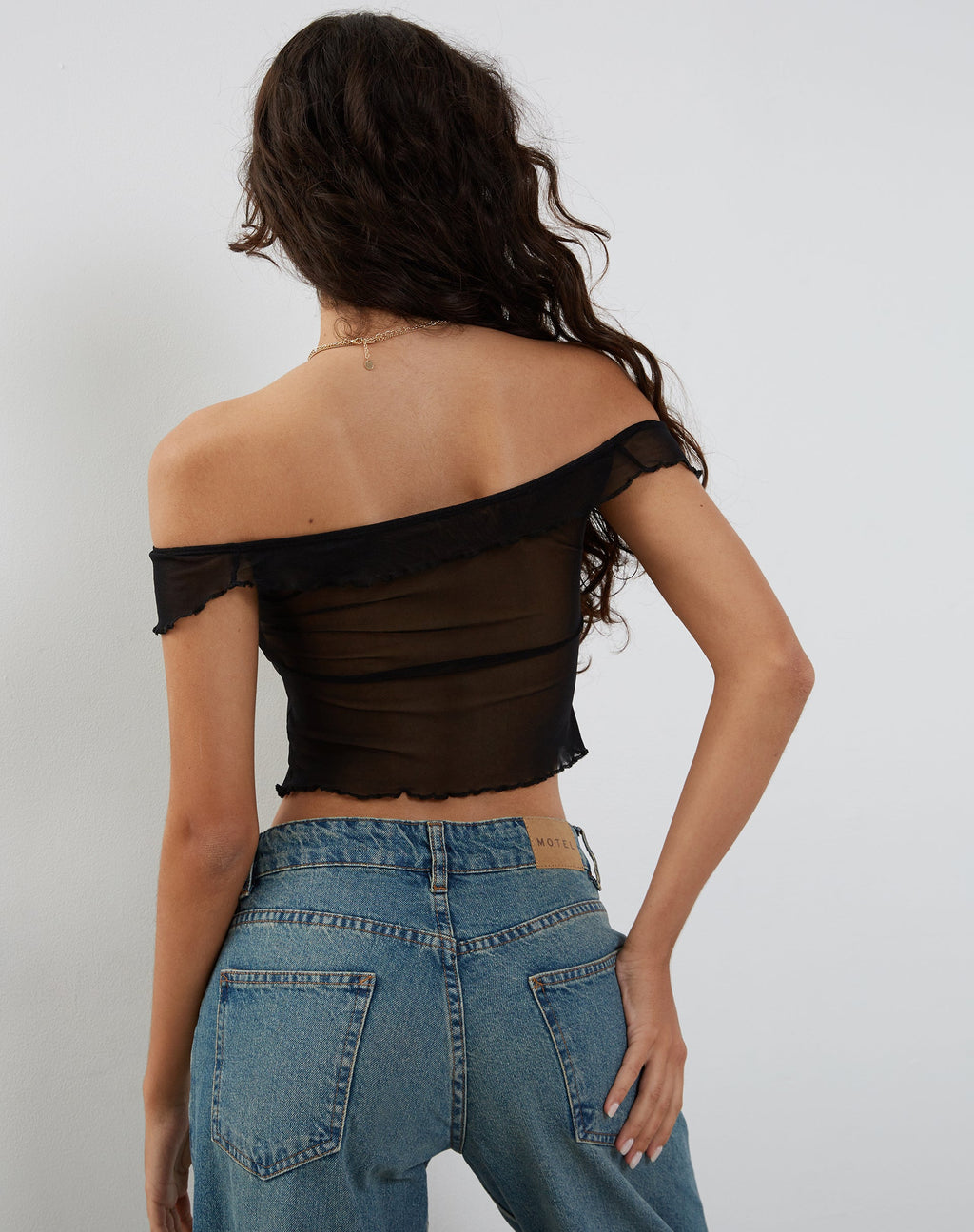 Top Nabil Bardot in maglia nera