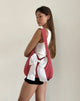 Immagine della borsa Nagi in percalle rosso con fiocco bianco