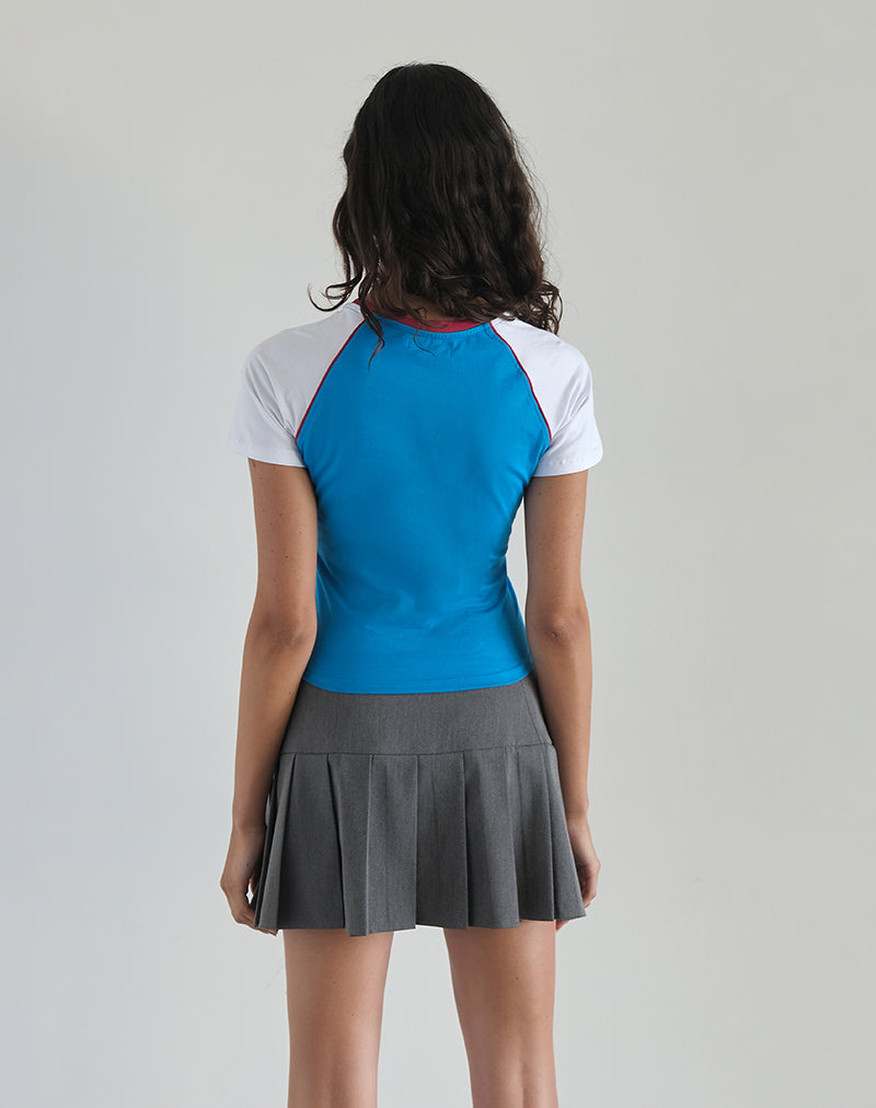 Immagine di Nagita Racer Top in blu acqua con rilegatura rossa