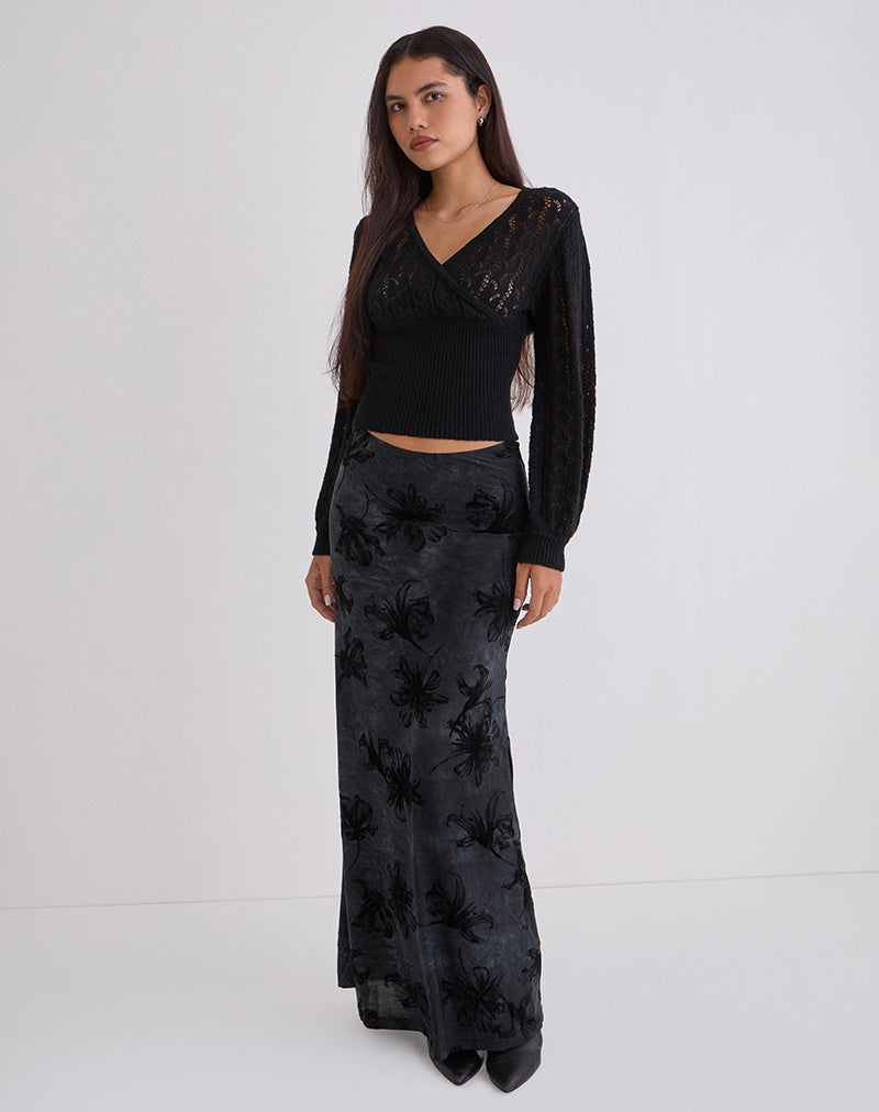 Immagine del top avvolgente Nilara in maglia pointelle nera