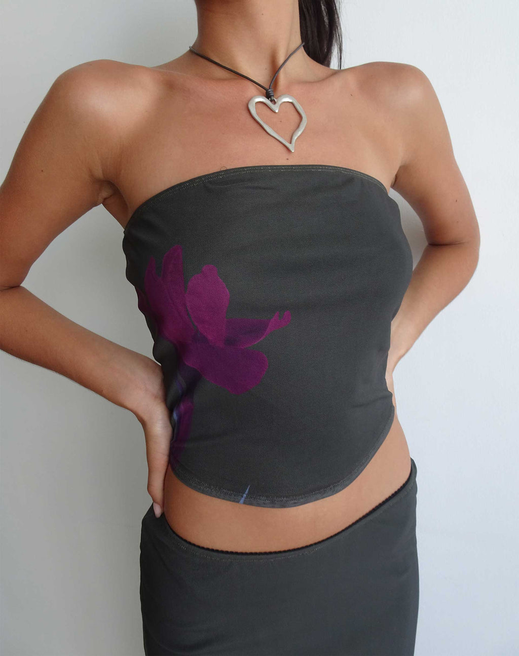 Top a fascia Peggy in verde con stampa floreale viola