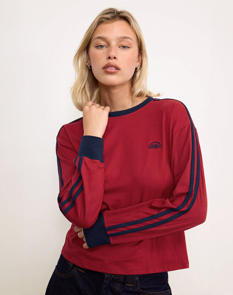 Top a maniche lunghe Prata in rosso adrenalinico con bordatura in blu