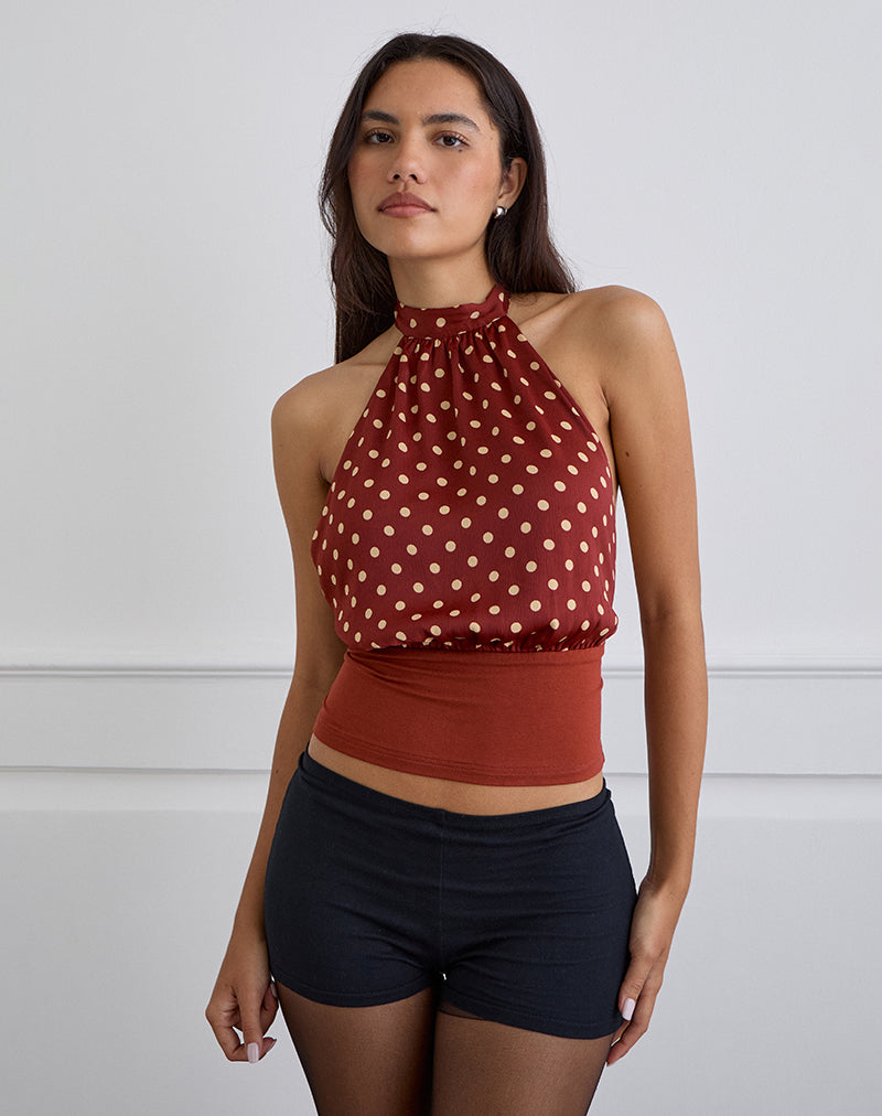 Top senza spalline Rania in rosso bruciato a pois