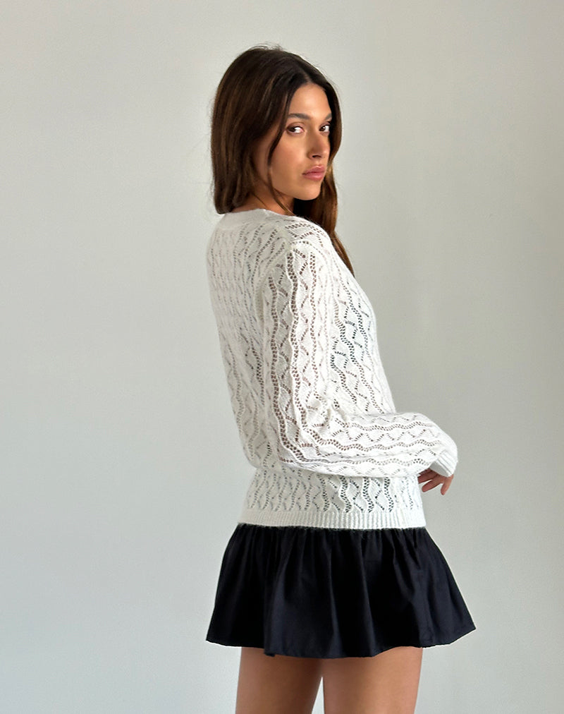 immagine del cardigan Ricani a maglia aperta in avorio