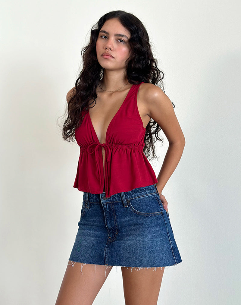 Top Rolia con laccetti in rosso adrenalinico