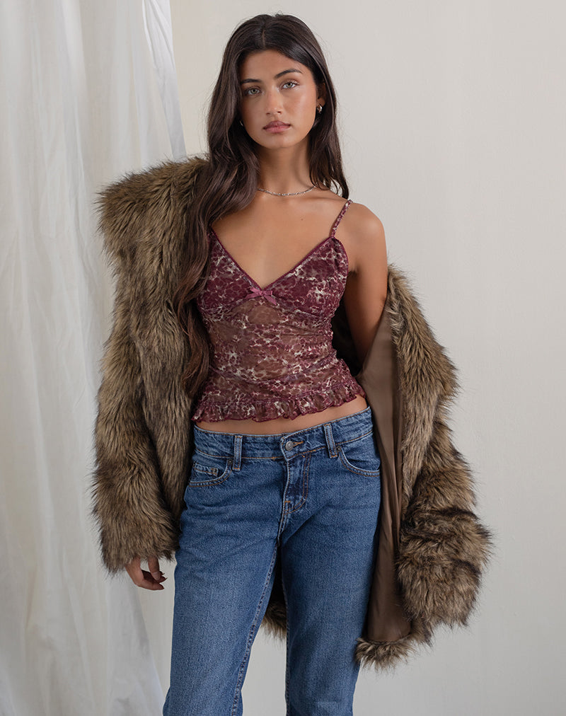 Top Rumaysa in pizzo stampato e macchie leopardate astratte