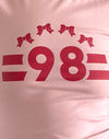 Pink Lady con rilegatura rossa Adrenaline e logo '98'.