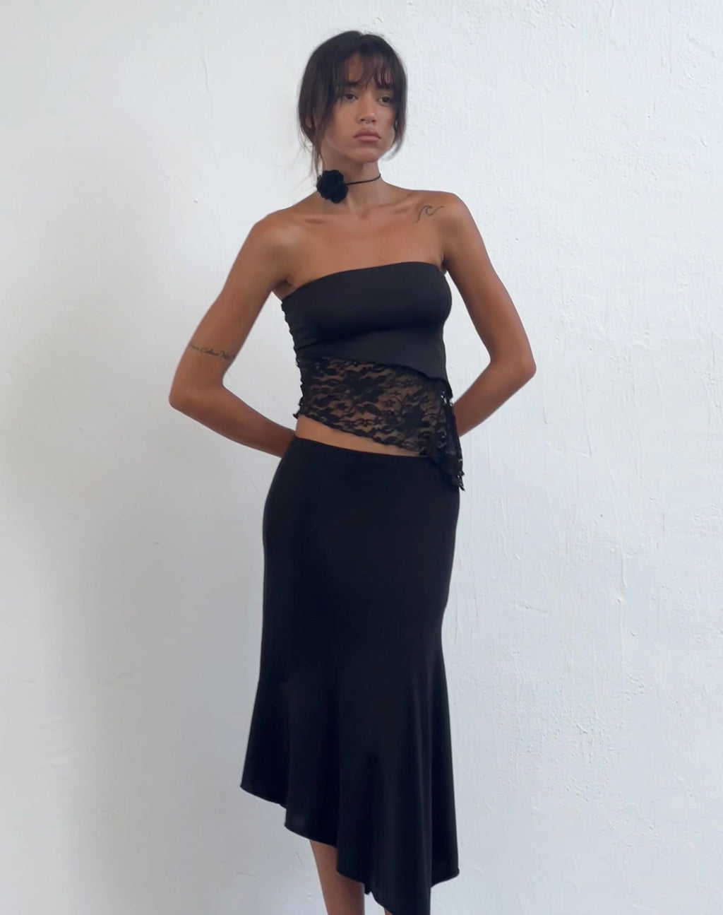 Top a fascia Shanda in pizzo nero