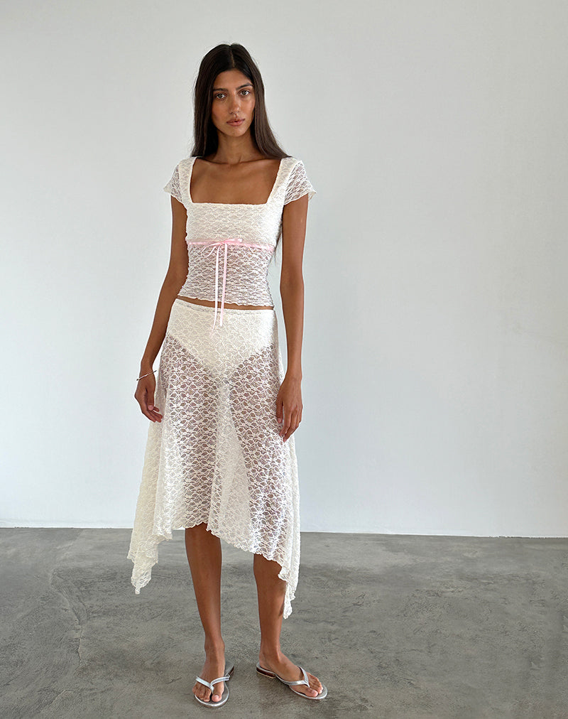 Immagine di Sherine - Top in pizzo color crema con rilegatura rosa