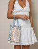 Immagine di Shi Bag in pizzo naturale ricamato con rilegatura in raso blu