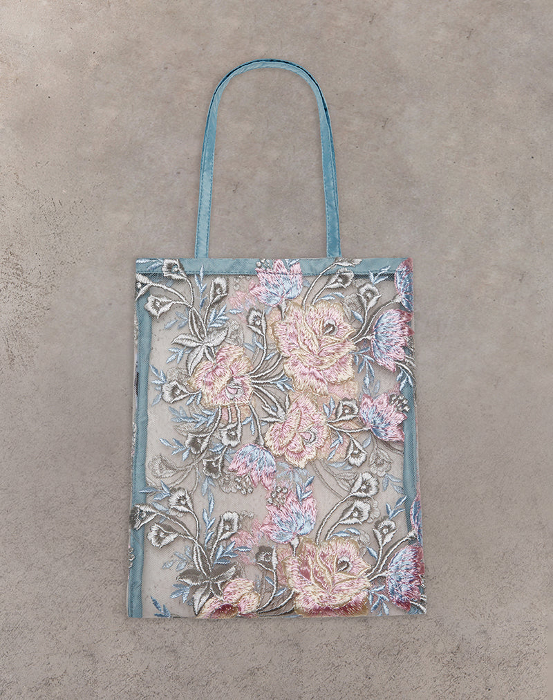 Immagine di Shi Bag in pizzo naturale ricamato con rilegatura in raso blu