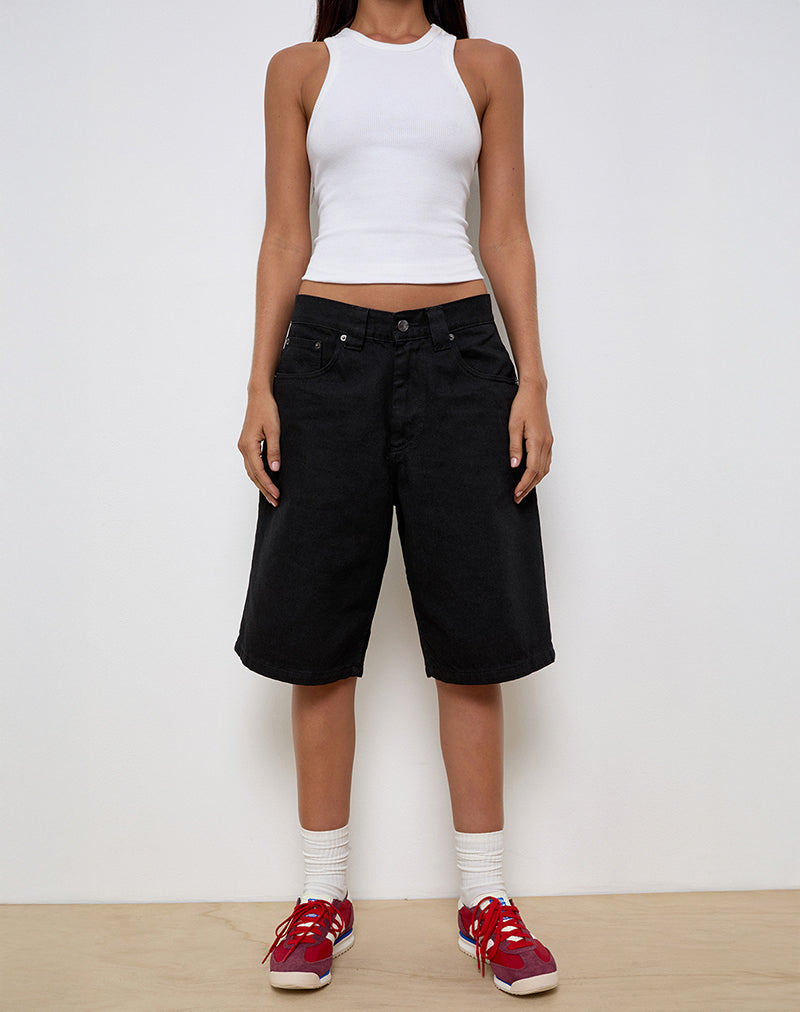 Pantaloncini skater a vita bassa in denim nero scamosciato