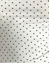 Bianco con stampa micropolka nera