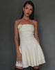 Immagine di Striata Mini Dress in crema con rosetta