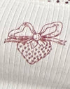 Bianco sporco con stampa fiocco alla fragola