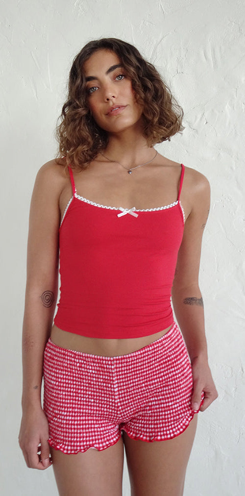 Immagine di Suna Gilet Top in rosso tango con finiture avorio