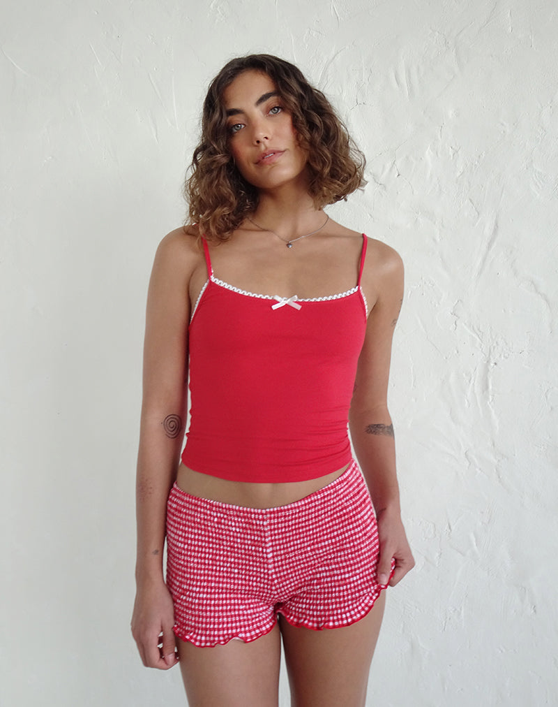 Immagine di Suna Gilet Top in rosso tango con finiture avorio