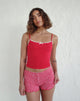 Immagine di Suna Gilet Top in rosso tango con finiture avorio