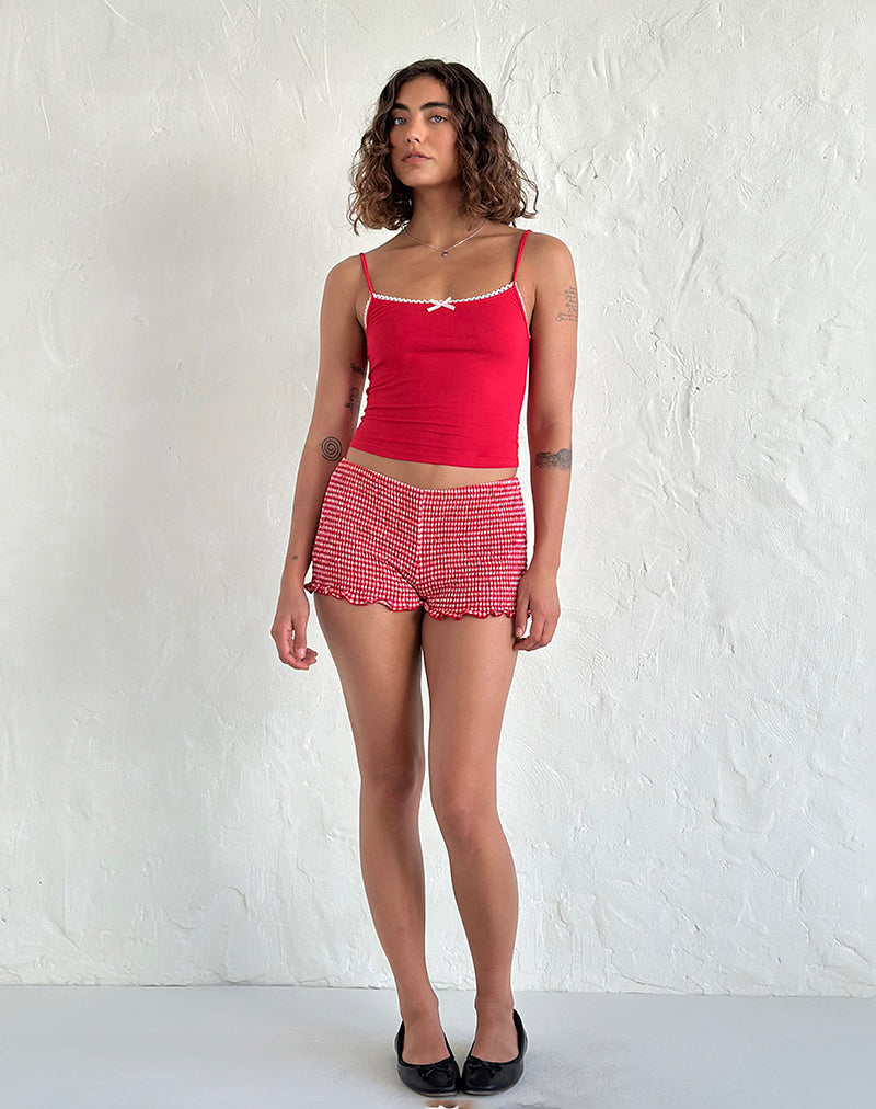 Immagine di Suna Gilet Top in rosso tango con finiture avorio