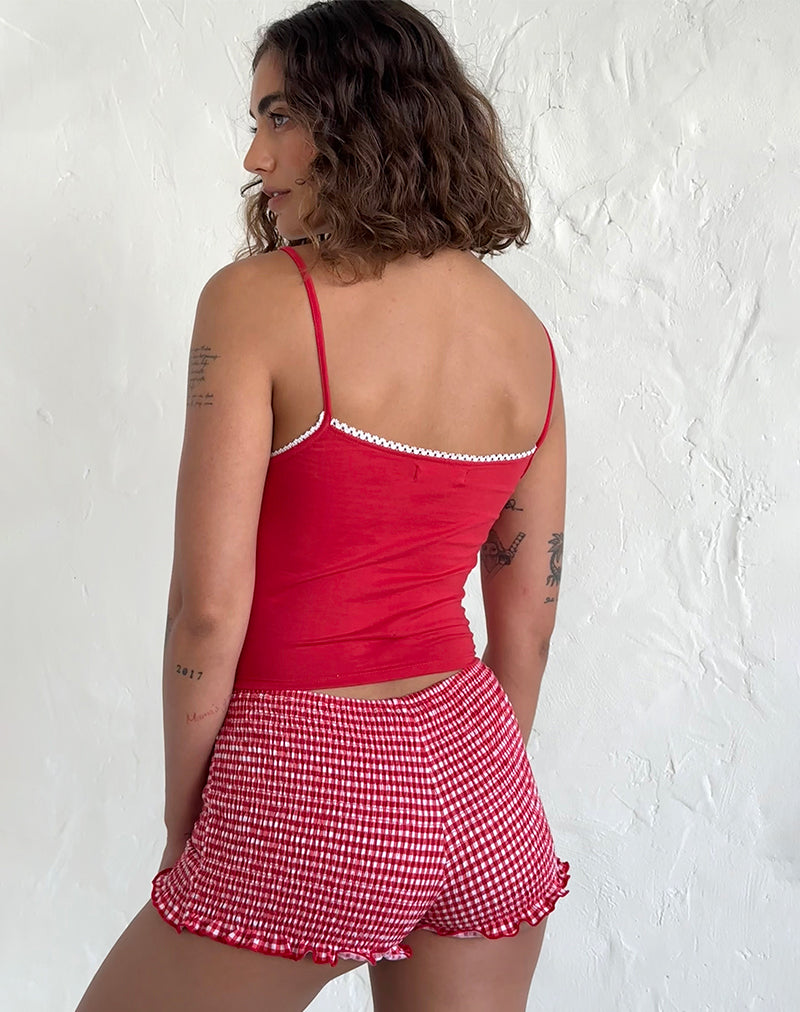 Immagine di Suna Gilet Top in rosso tango con finiture avorio