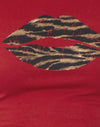 Rosso adrenalina con stampa labbra leopardata