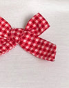 Bianco con fiocco in percalle rosso
