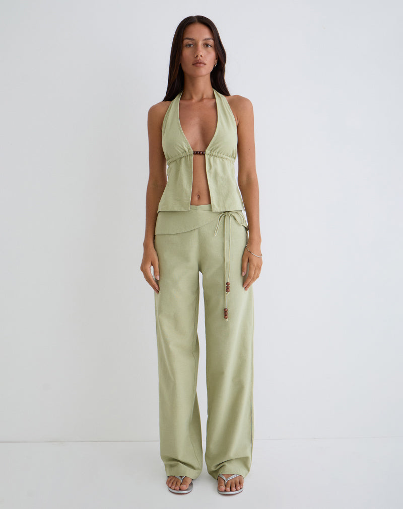 Immagine di Syrma Backless Halter Top in lino verde salvia