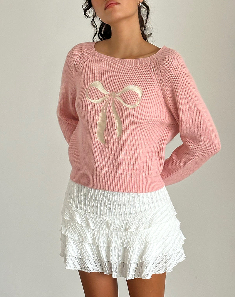Maglia Tami in maglia rosa con ricamo a fiocco bianco