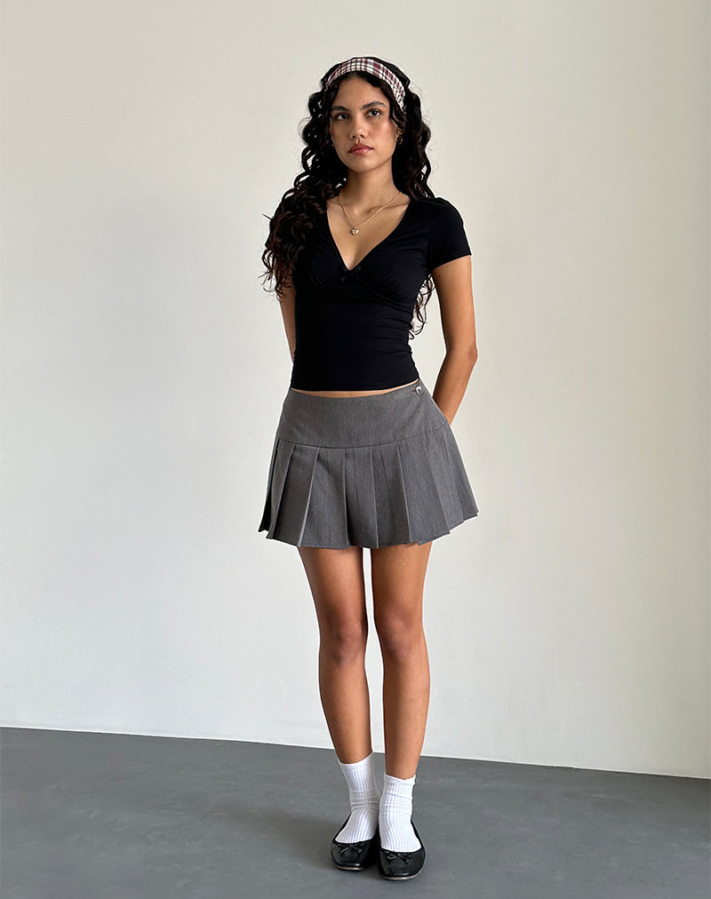 Immagine di Tasina Top in nero con rilegatura in nero