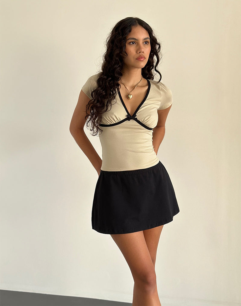 Immagine di Tasina Top in Latte di cocco con rilegatura nera