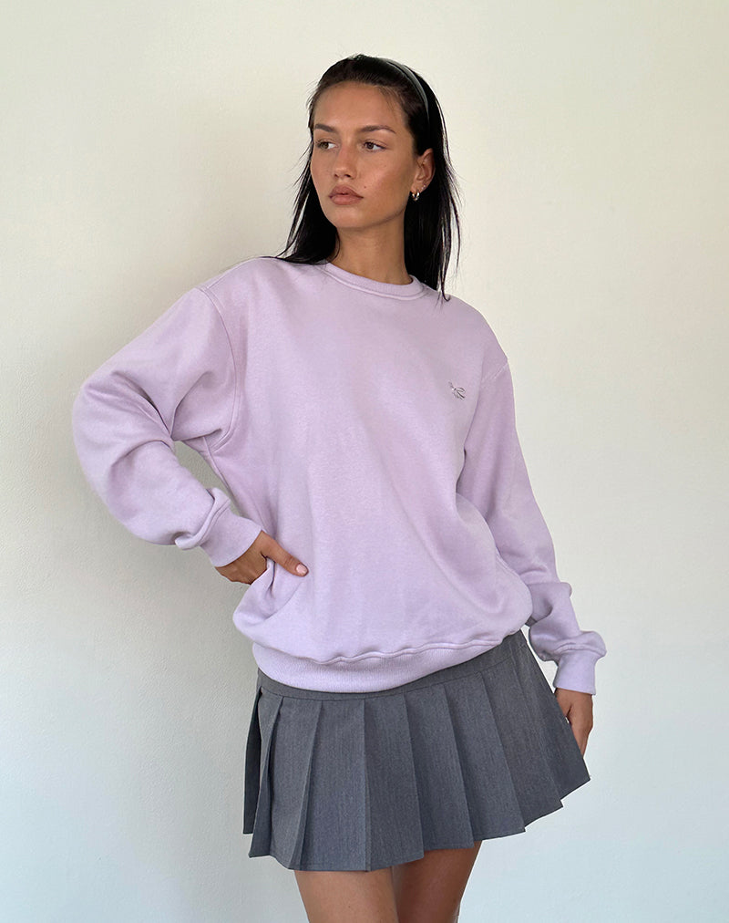Immagine del maglione Tillie in viola con fiocco ricamato in grigio