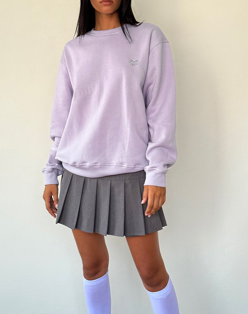 Immagine del maglione Tillie in viola con fiocco ricamato in grigio