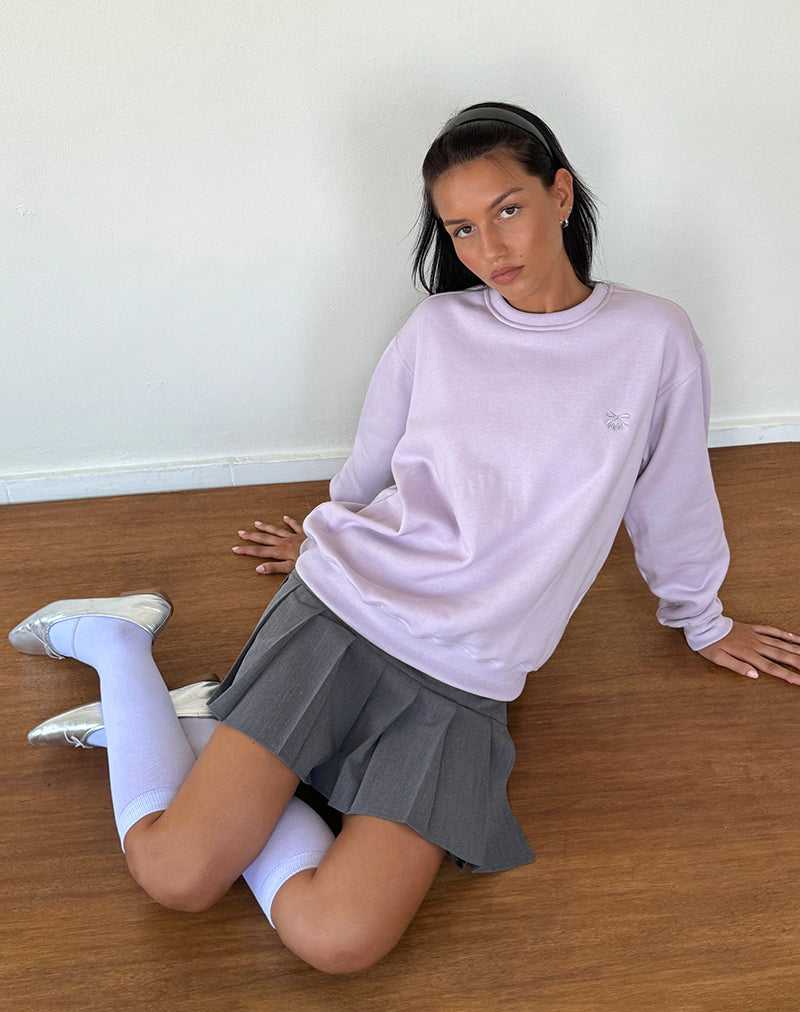 Immagine del maglione Tillie in viola con fiocco ricamato in grigio