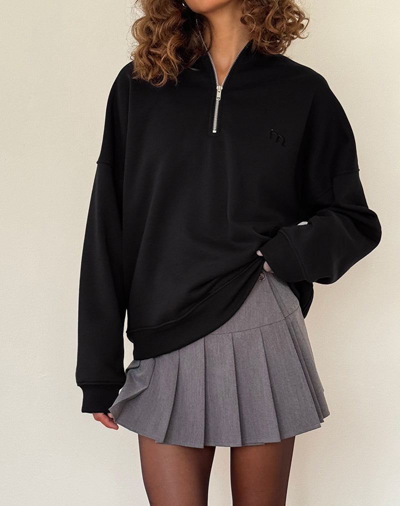 Immagine di Tirma Maglia a collo alto in nero tonale con ricamo M
