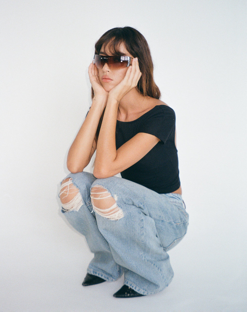 Jeans strappati extra larghi a vita bassa con lavaggio blu vintage